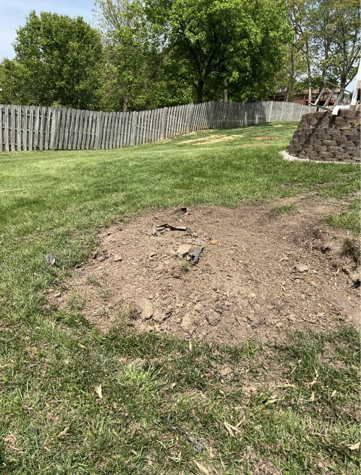 Tracked stump grinder in backyard